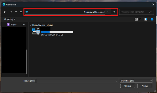 Okno Eksploratora plików, otworzone automatycznie przez fałszywą stronę, z wprowadzonym złośliwym skryptem w pasek adresu Eksploratora. Po kliknięciu klawisza Enter, następuje zainfekowanie komputera 
